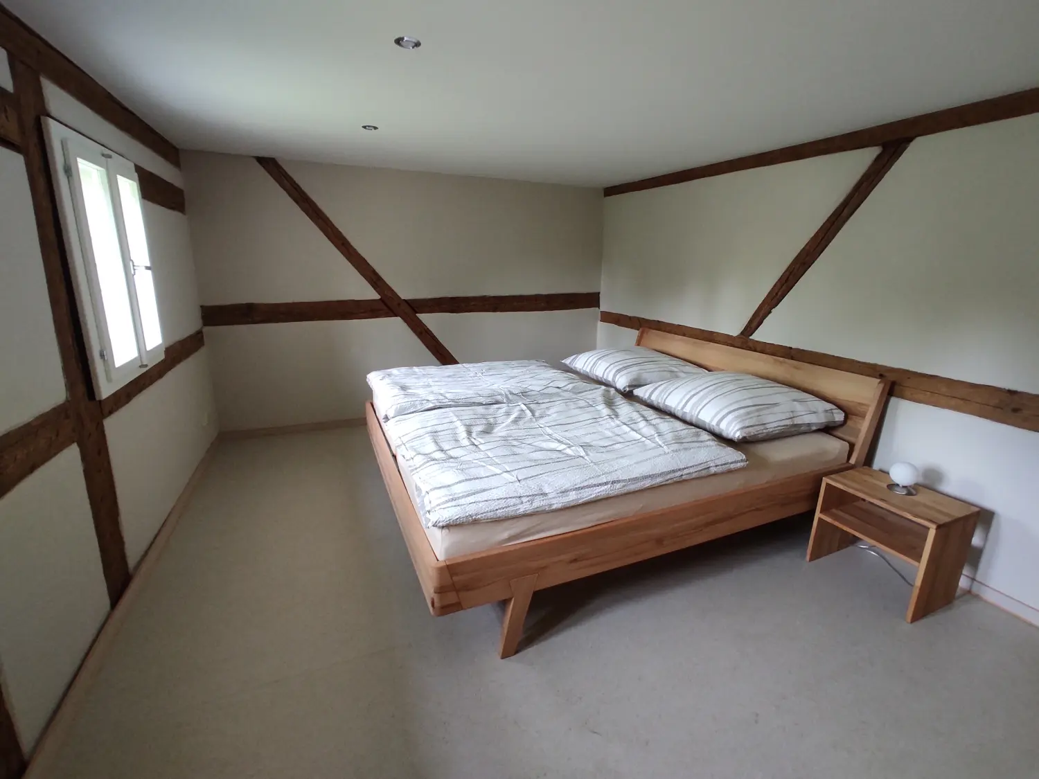  Ferienwohnungen Flachshäusl – Schlafzimmer Bloßstock